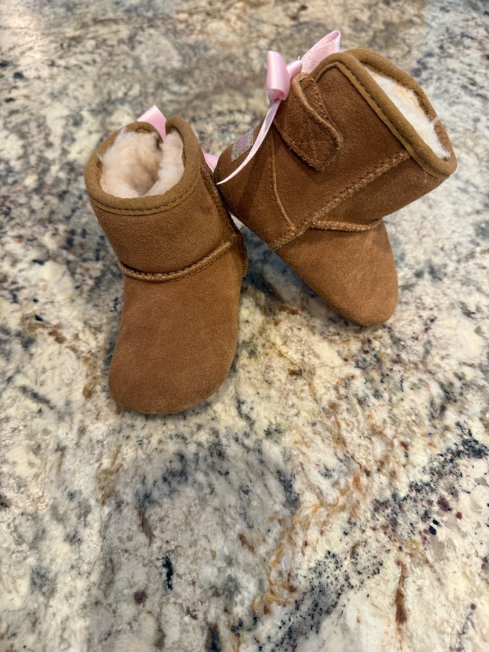 UGG Brown Baby Suede Booties with Pink Ribbon